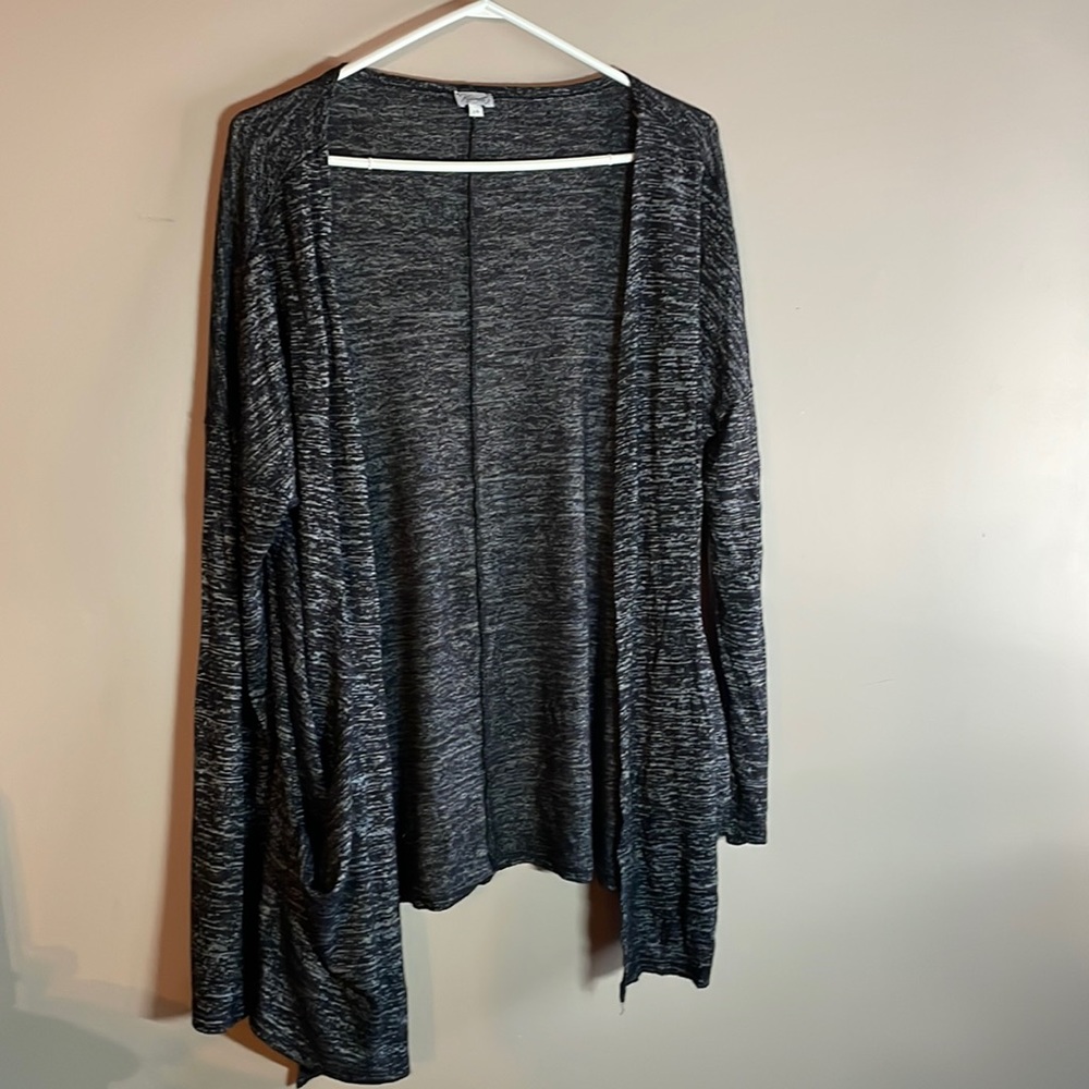 Black and grey sweater/cardigan with pockets.